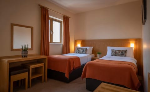 Premium bedding, individually decorated, individually furnished, desk