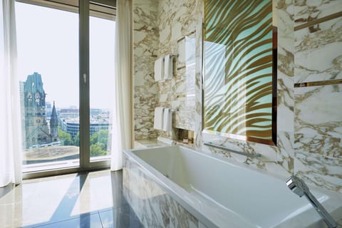 Junior Suite, 1 King Bed, City View | Bathroom | Combined shower/tub, rainfall showerhead, designer toiletries