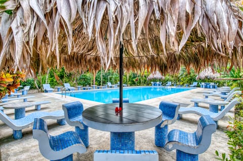 Outdoor pool, free cabanas, pool umbrellas