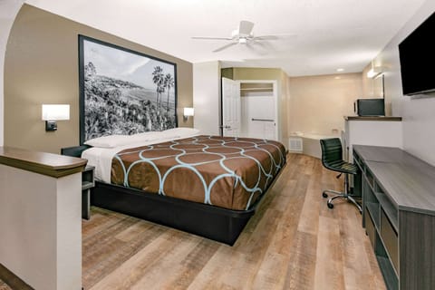 Suite, 1 King Bed, Non Smoking | In-room safe, blackout drapes, iron/ironing board, free WiFi