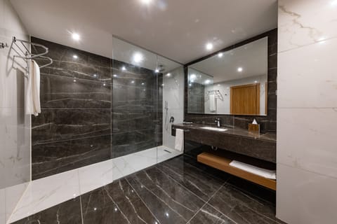 Junior Suite, 1 King Bed, Non Smoking, Resort View | Bathroom | Shower, rainfall showerhead, free toiletries, hair dryer