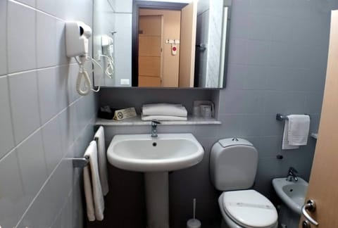 Bathroom | Hair dryer, bidet, towels, soap