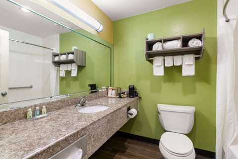 Standard Room, 2 Queen Beds, Non Smoking | Bathroom | Combined shower/tub, towels, soap, toilet paper