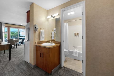 Suite, 1 Queen Bed with Sofa bed, Kitchen, Partial Ocean View | Bathroom | Combined shower/tub, free toiletries, hair dryer, towels