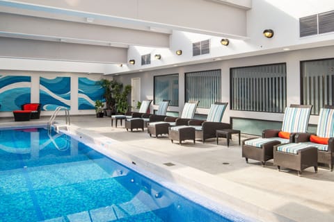 Indoor pool, outdoor pool, open 5:30 AM to 10:00 PM, sun loungers