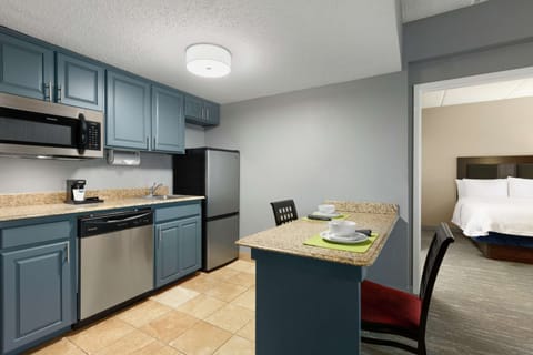 2 Queens Suite w/Sofabed & Kitchenette | Private kitchen | Fridge, microwave, coffee/tea maker