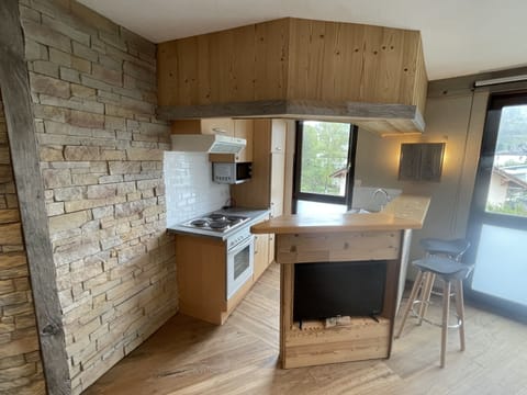 Flat-screen TV, foosball, table tennis, books