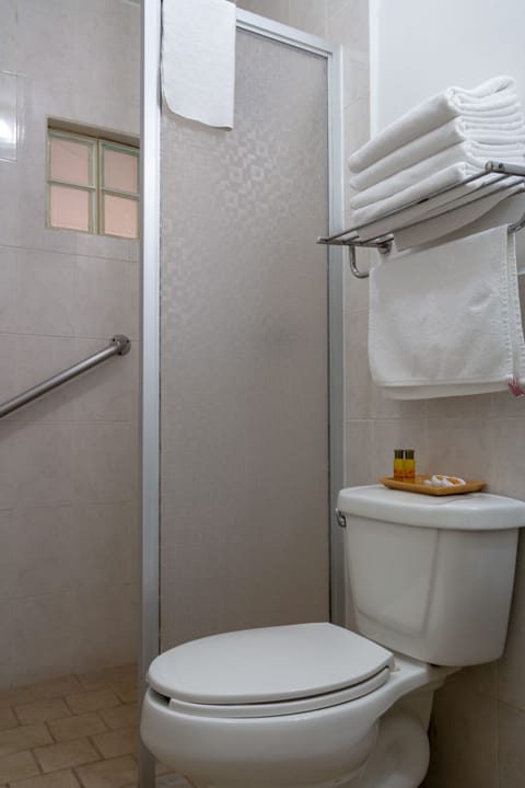 Standard Double Room, 2 Double Beds | Bathroom | Shower, hair dryer, towels, soap