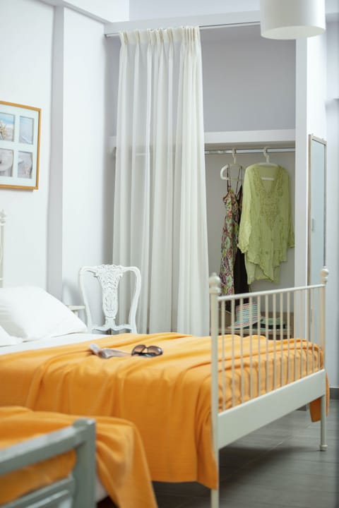 Family room with Balcony | Premium bedding, in-room safe, soundproofing, iron/ironing board