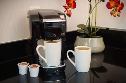 Hypo-allergenic bedding, down comforters, pillowtop beds, in-room safe