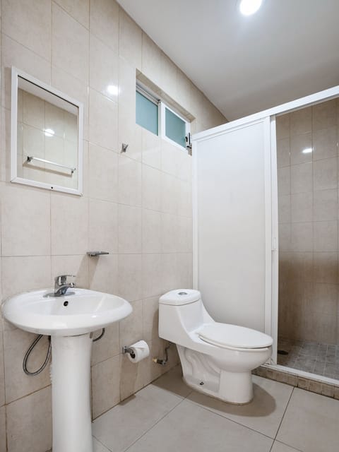 Standard Room, Multiple Beds | Bathroom | Shower, free toiletries, towels, soap