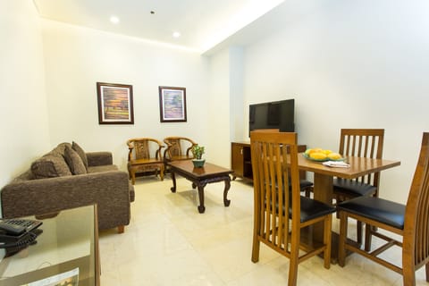 Junior Suite | Living area | 0-inch LCD TV with satellite channels