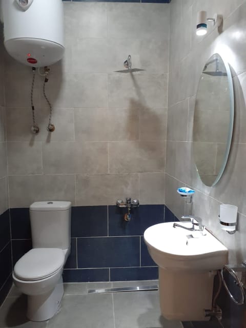 Separate tub and shower, free toiletries, hair dryer, slippers