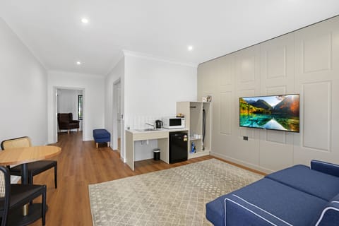 Accessible York Suite | Living area | 50-inch flat-screen TV with digital channels, TV