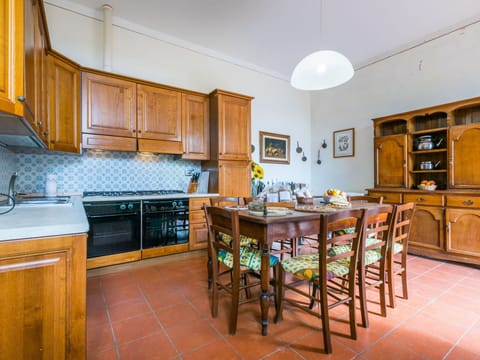 Furniture, Property, Cabinetry, Countertop, Wood, Interior Design, Kitchen, Flooring, Table, Floor