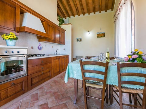 Cabinetry, Furniture, Property, Countertop, Flower, Table, Plant, Houseplant, Chair, Building