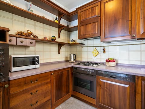 Cabinetry, Countertop, Property, Kitchen Appliance, Kitchen Stove, Building, Wood, Blue, Kitchen, Drawer