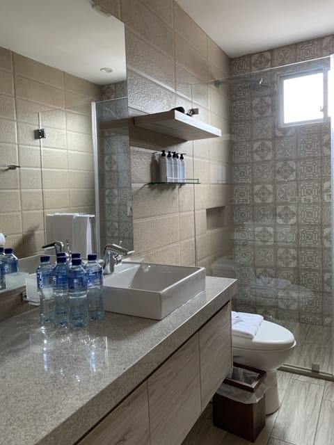 City Room, Multiple Beds | Bathroom | Shower, rainfall showerhead, hair dryer, towels