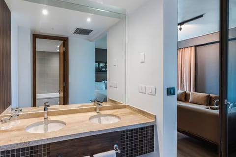 Suite, 1 Bedroom | Bathroom | Shower, free toiletries, hair dryer, towels