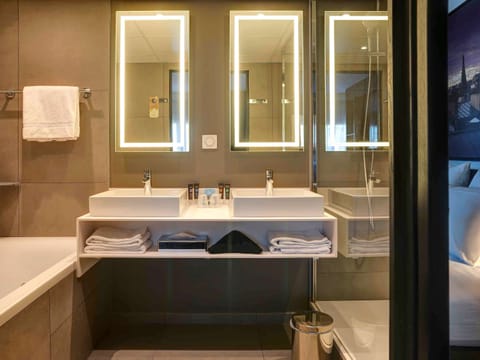 Suite, 1 King Bed with Sofa bed (Paris View) | Bathroom | Eco-friendly toiletries, hair dryer, towels