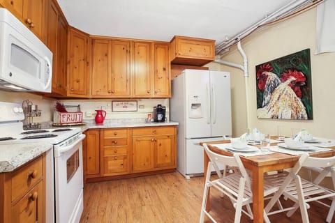 This darling kitchen is equipped with all you may need to cook a gourmet meal.