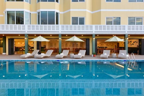 Outdoor pool, open 8:00 AM to 7:00 PM, pool umbrellas, sun loungers