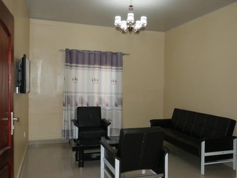 Standard Double Room | Living room | 32-inch LCD TV with cable channels, TV