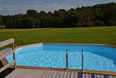 Seasonal outdoor pool, pool umbrellas, sun loungers