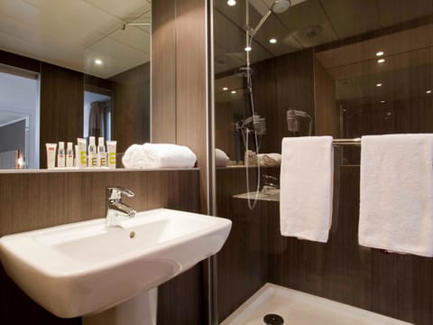 Shower, eco-friendly toiletries, hair dryer, towels