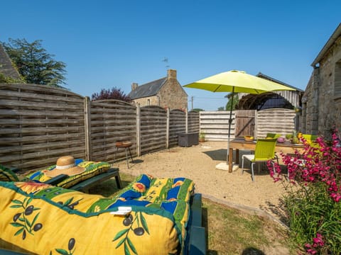 Sky, Plant, Property, Azure, Shade, Building, Flower, Outdoor Furniture, Biome, Tree