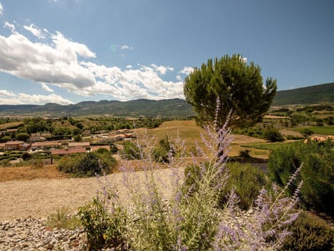 Sky, Plant, Cloud, Natural Environment, Mountain, Natural Landscape, Tree, Land Lot, Grass, Landscape