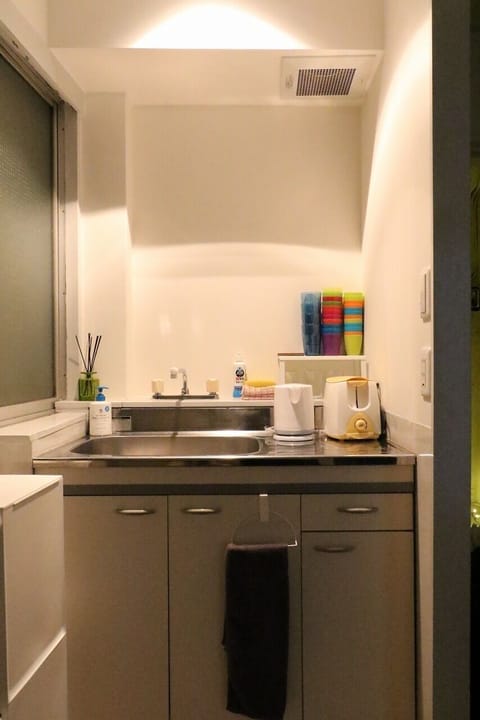 Apartment | Private kitchenette | Fridge, microwave, stovetop, cookware/dishes/utensils