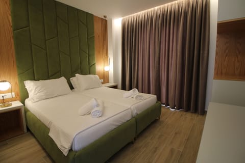 Deluxe Double or Twin Room, City View, Beachside | Premium bedding, memory foam beds, minibar, in-room safe