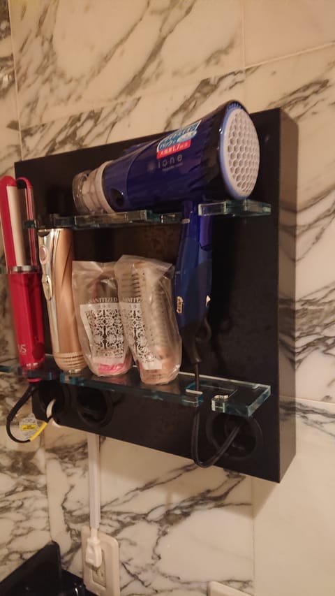 Combined shower/tub, free toiletries, hair dryer, bathrobes