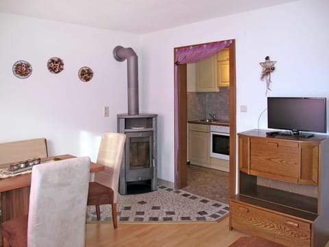 Furniture, Property, Television, Interior Design, Wood, Cabinetry, Lighting, Home Appliance, Living Room, Drawer