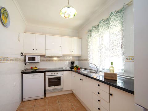 Kitchen, Kitchen Appliance, Countertop, Major Appliance, Cabinetry, Interior Design, Furniture, Flooring, Home Appliance, Home