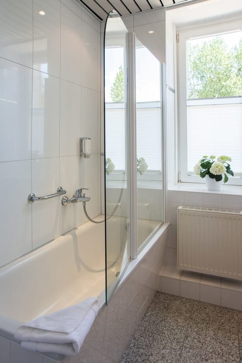 Comfort Room, 1 Double Bed, Lakeside | Bathroom | Combined shower/tub, hair dryer, towels