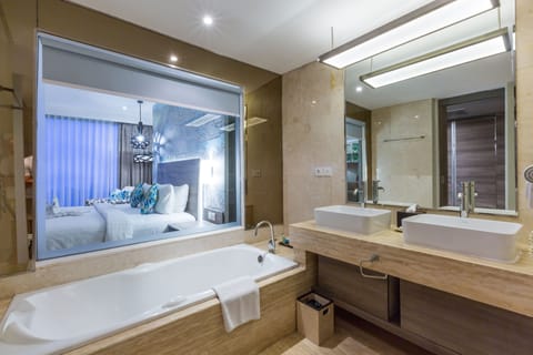 Suite, 1 King Bed, Ocean View | Bathroom | Shower, free toiletries, hair dryer, slippers