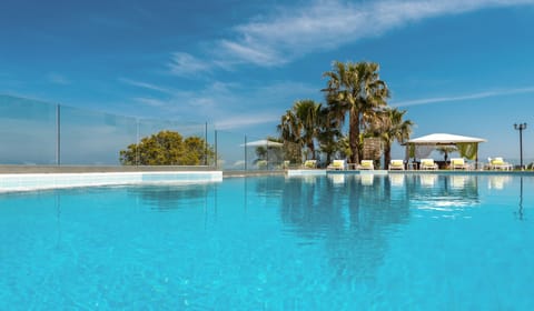 Outdoor pool, open 8:30 AM to 8:30 PM, pool umbrellas, sun loungers