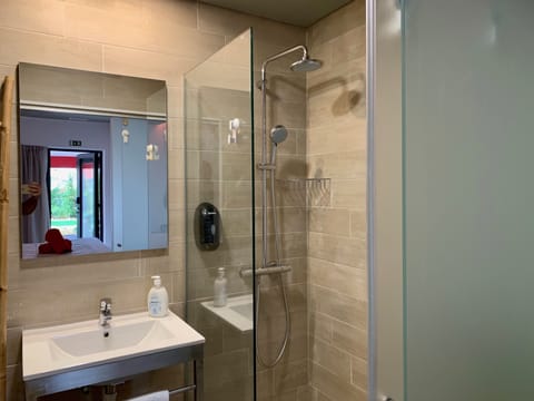 Double Room, Garden View (Eco-Garden) | Bathroom | Shower, rainfall showerhead, towels