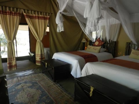 Luxury Tent | Desk, blackout drapes, bed sheets