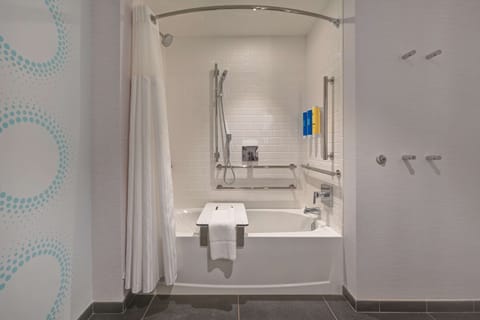 Combined shower/tub, hair dryer, towels, soap