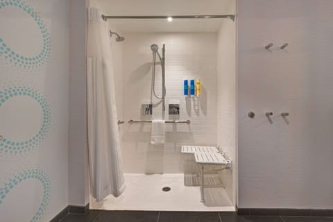 Combined shower/tub, hair dryer, towels, soap