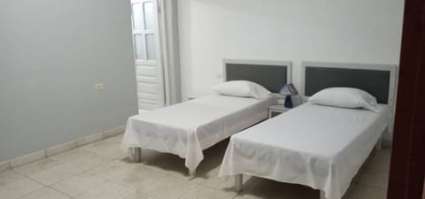 Standard Double Room, 2 Twin Beds | Blackout drapes, WiFi, bed sheets