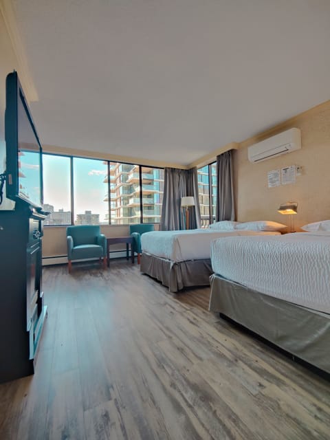 One Bedroom Apartment with Balcony, Robson Street | Premium bedding, down comforters, in-room safe, desk