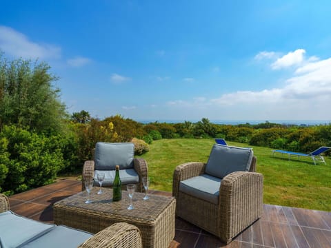 Cloud, Sky, Furniture, Table, Plant, Property, Chair, Outdoor Furniture, Natural Landscape