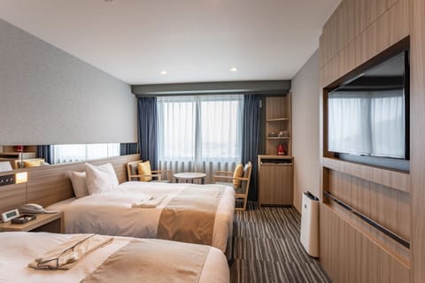Standard Twin Room | Down comforters, iron/ironing board, free WiFi, bed sheets