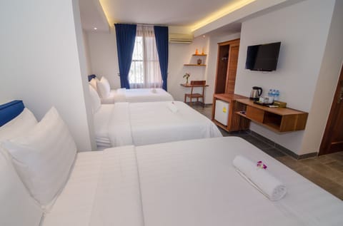 Deluxe Triple Room (Free Airport Pick Up) | 20 bedrooms, minibar, in-room safe, desk