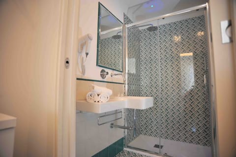 Deluxe Double Room, Balcony, Sea View | Bathroom | Shower, free toiletries, hair dryer, slippers