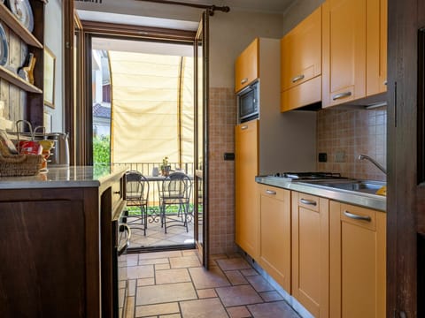 Cabinetry, Property, Countertop, Furniture, Interior Design, Wood, Kitchen Appliance, Kitchen, Kitchen Sink, Building